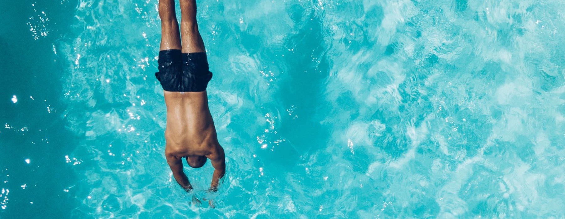 a man swimming in the water